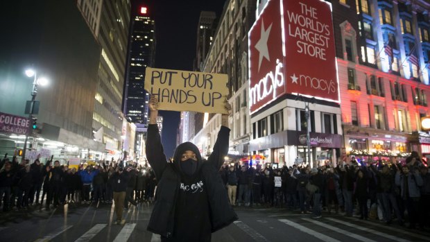 Protestors march in New York in 2014 following a grand jury's decision not to indict the police officer involved in the death of Eric Garner.
