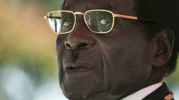 President Robert Mugabe waits to deliver a speech in 2008.