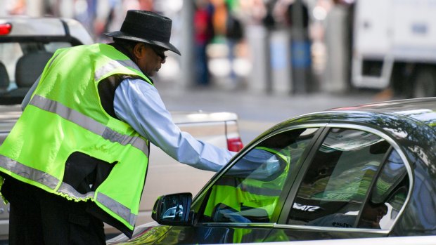 Parramatta parking inspectors' preference for using industrial crayon, rather than chalk, has drawn attention to a legal loophole.  