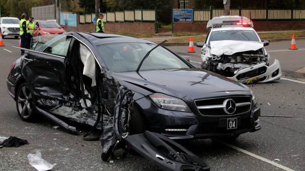 Gai Vieira's car was hit by a speeding police car. 