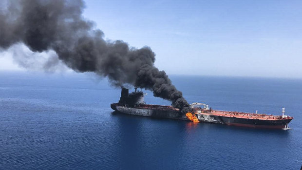 An oil tanker on fire in the Sea of Oman. A series of attacks on oil tankers near the Persian Gulf has ratcheted up tensions between the US and Iran.

