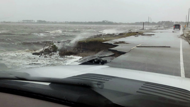 Wind and water from Hurricane Florence damaged the highway leading off Harkers Island, North Carolina. 