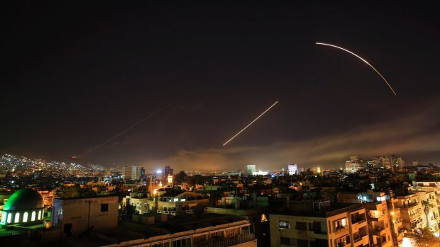 Missiles streak across the Damascus skyline as the U.S. launches an attack on Syria targeting different parts of the capital.