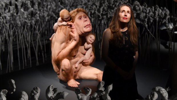 Patricia Piccinini stands among The Field.