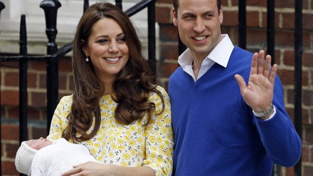 Princess Kate and Prince William smile as they show off their newborn Princess Charlotte in 2015 from The Lindo Wing of St Mary's Hospital in London.
