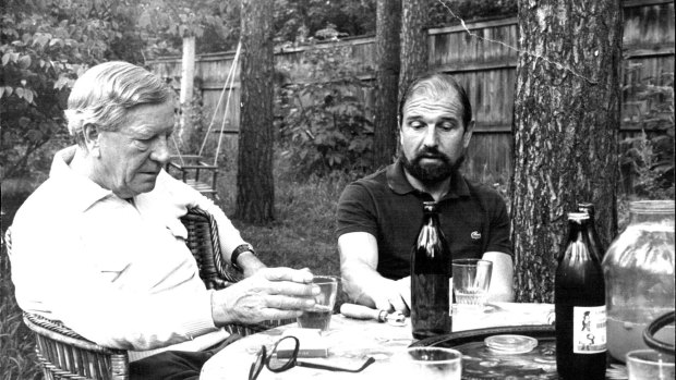 Kim Philby (left) and George Blake talk over a bottle of wine in Blake's garden in Soviet Russia, 1979. Blake was the last survivor of the group of infamous British turncoats of the cold war era. 