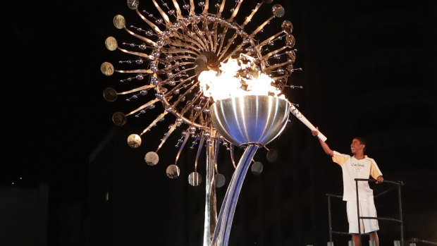 The flame is lit at the opening ceremony of the 2016 Rio de Janerio Olympics. The Queensland Opposition is backing a Brisbane bid.