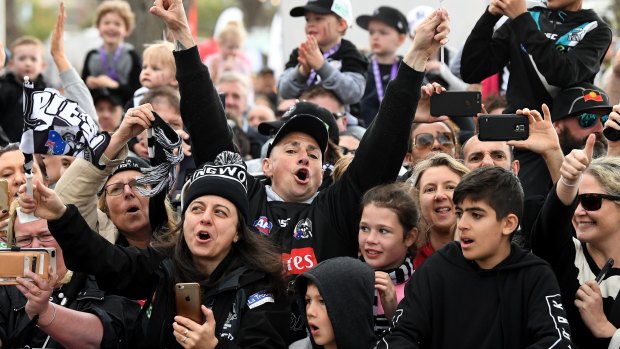 Collingwood fans during the AFL Grand Final Parade in Melbourne, Friday.