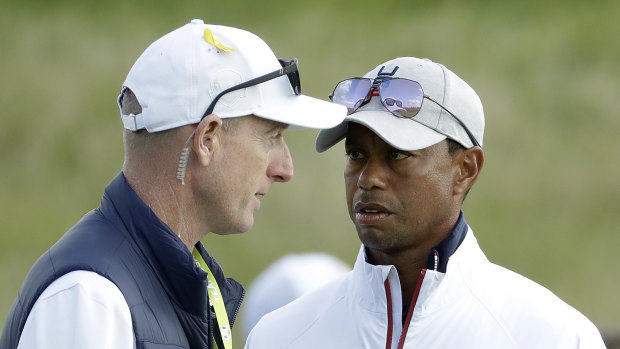 "I have not heard that he has had a back problem so I would say that is not true": Jim Furyk and Tiger Woods.