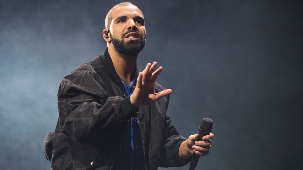 Drake has responded to criticism over a photo showing him in blackface.