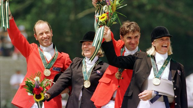 Andrew Hoy, Wendy Schaeffer, Phillip Dutton and Gillian Rolton celebrate their gold medal win at the 1996 Olympics. 