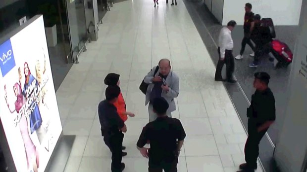 CCTV footage shows Kim Jong-nam speaking with Kuala Lumpur airport officials after the attack.