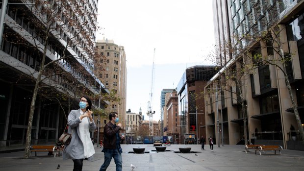 Martin Place in the Sydney CBD is empty of office workers after another day of more locally transmitted cases of Covid-19. Those in the city were mostly wearing masks. 24th June 2021 Photo: Janie Barrett