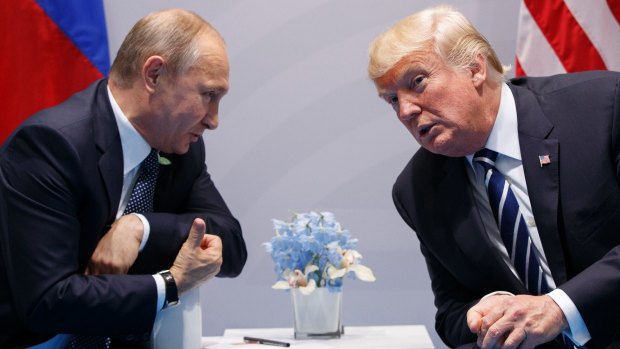 Russian President Vladimir Putin meets US President Donald Trump. 