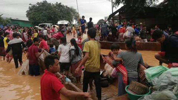 Rescue efforts are ongoing in villages flooded after part of a newly built hydroelectric dam was breached in southeastern Laos.