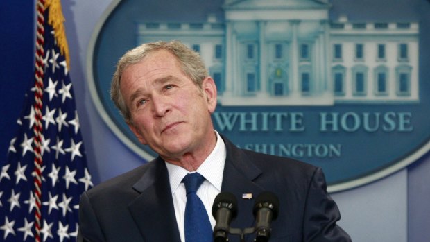 George W Bush pauses during his final press conference in 2009.