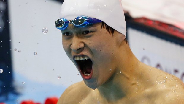 Jubilation: Sun Yang celebrates his 400m freestyle title at London 2012, one of his three Olympic victories.