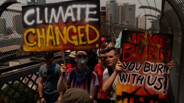 Bridge walk for climate justice. Protesters cross the Sydney Harbour Bridge in support of climate change action in November.