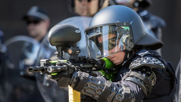 Police demonstrating their new equipment in March.