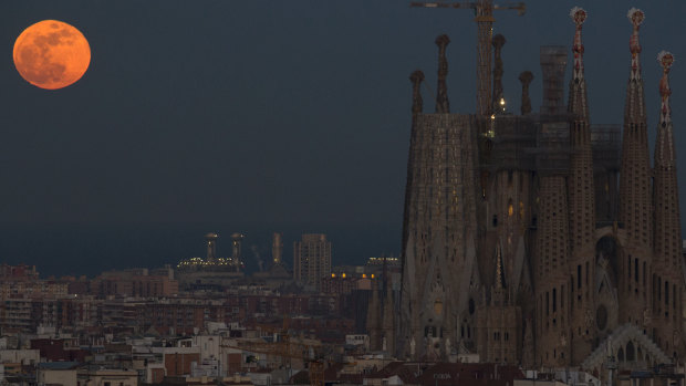 Barcelona’s Sagrada Familia Basilica is backdropped by a super blood moon in January 2018.