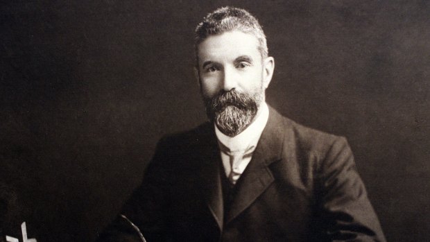 Alfred Deakin at his desk.