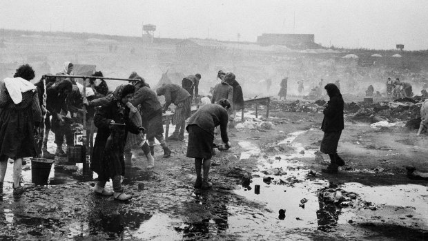 Female inmates at Bergen-Belsen concentration camp in Germany, shown in an official British photo from April 1945.