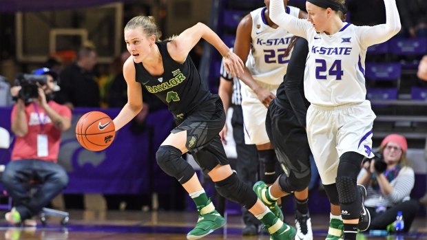 WNBA-drafted talent Kristy Wallace has signed with the Canberra Capitals. 