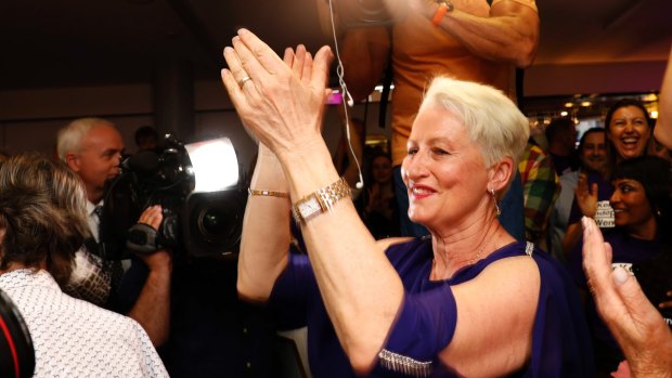 Independent candidate for Wentworth Kerryn Phelps is congratulated by supporters as she arrives for a Wentworth by-election evening function at North Bondi Life Saving Club, Sydney.