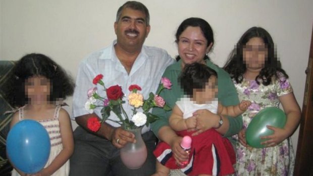 Baha'i man Hamed bin Haydara - here with his family - was sentenced to death by a Yemeni court on charges of spying for Israel and converting Muslims to the Bahai faith.