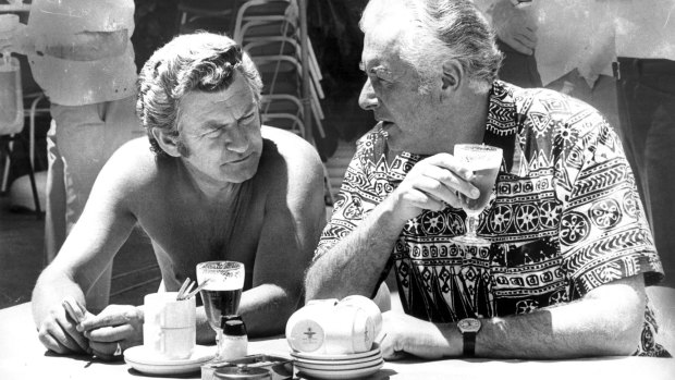 Bob Hawke and Gough Whitlam enjoy a beer by the pool of the Florida Hotel  in 1975. 
