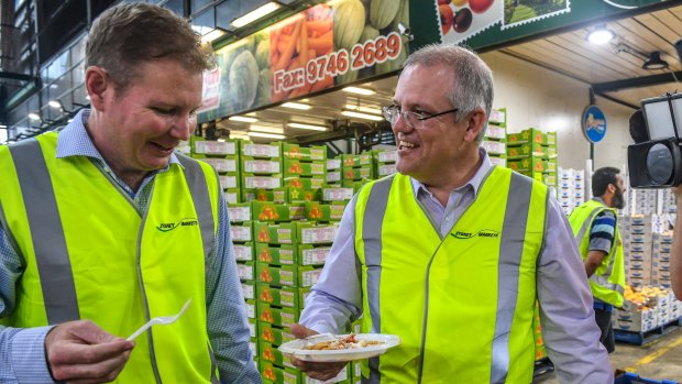 Craig Laundy and Scott Morrison, then treasurer, visit the Sydney Markets in Homebush in 2017.