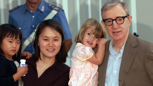Woody Allen with wife Soon Yi and adopted daughters Bechet and Manzie at the Venice Film Festival in 2003.