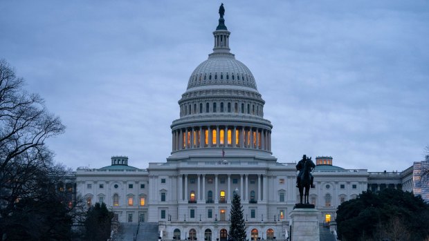 The US Capitol is seen under early morning gray skies in Washington.