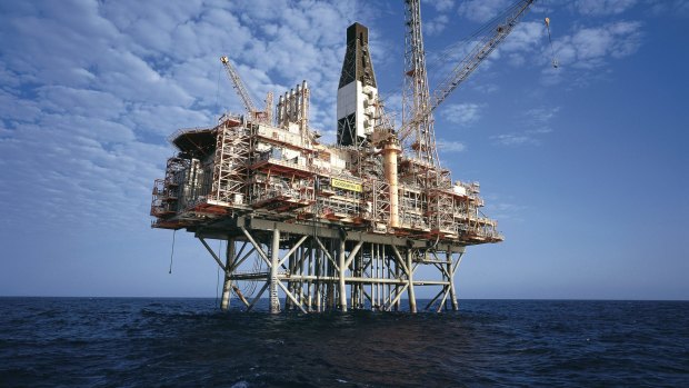 A Woodside Petroleum platform on the North West Shelf. Cabinet papers from 2000 show the Howard government's battle to balance support for the industry and its greenhouse gas reduction policy.