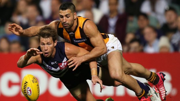 Paul Puopolo breathes down the neck of Docker Lee Spurr in 2015.