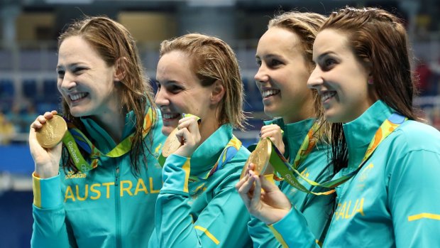 Queens of the pool: Cate Campbell, Bronte Campbell, Emma McKeon and Brittany Elmslie after winning the women's 4x100 meter freestyle final and setting a new world record in the process.