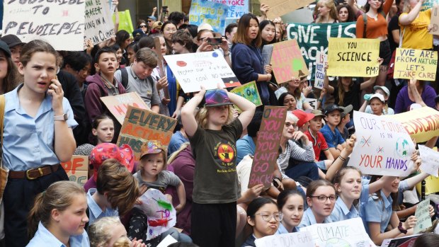 Thousands of students protested in Martin Place regarding climate change policy in November last year, and will gather again in Sydney on Friday.