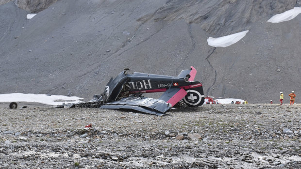 The wreckage of the old-time propeller plane Ju 52  after it crashed in Switzerland.