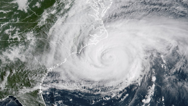 This satellite image provided by NOAA shows Hurricane Florence on the eastern coast of the United States.