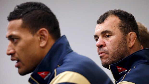 Better days: Israel Folau and Michael Cheika in 2015. 