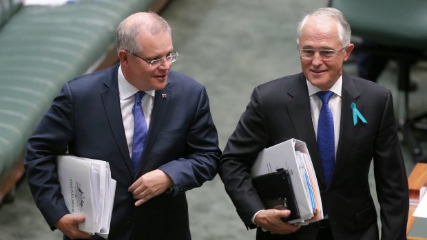 Prime Minister Scott Morrison and  Malcolm Turnbull in Parliament 