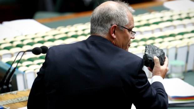 Backing black: Then federal Treasurer Scott Morrison brought a lump of coal to question time in February 2017.