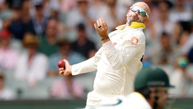 Nathan Lyon of Australia bowls during day three.