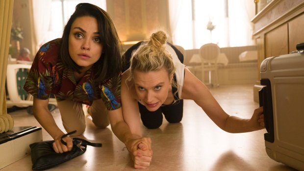 Audrey (Mila Kunis) and Morgan (Kate McKinnon) dodge bullets in The Spy Who Dumped Me.
