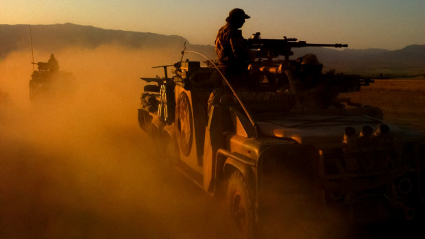 Special Forces Task Group members on patrol in Afghanistan in 2005.