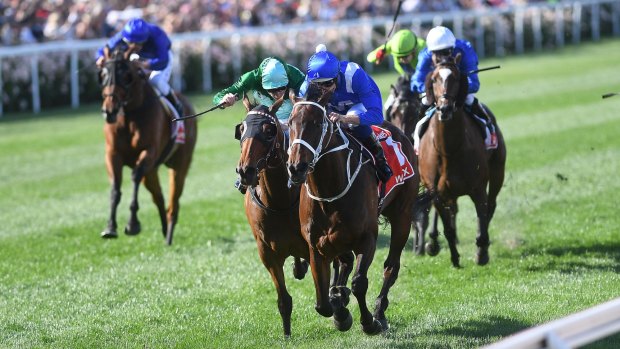 Super mare: Hugh Bowman rides Winx to victory in the Cox Plate ahead of Humidor in 2017.