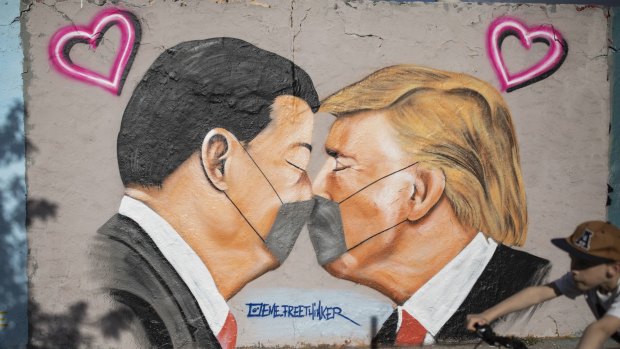 Graffiti in Berlin showing the face-off between Chinese President Xi Jinping and US President Donald Trump.

