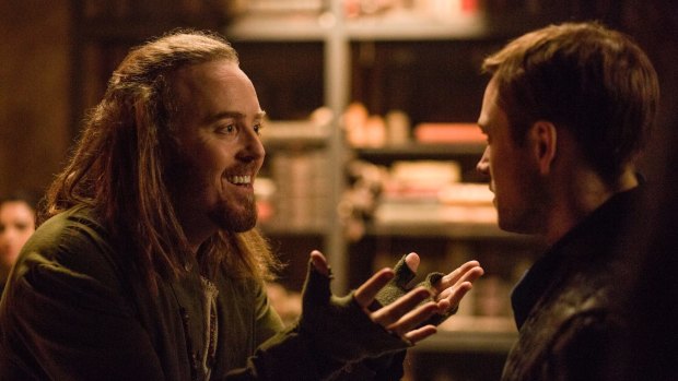 Tim Minchin, left, as Tuck and Taron Egerton, right, in Robin Hood. 