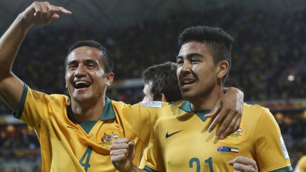 Big victory: Tim Cahill and Massimo Luongo celebrate a 4-1 win against Kuwait in 2015.