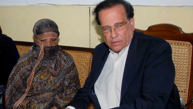  Salman Taseer, governor of Punjab Province, with Asia Bibi, at a prison in Sheikhupura near Lahore, in 2010. Taseer was shot dead in 2011 after speaking out against Pakistan's blasphemy laws.